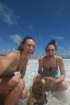 Two women and a little boy at the beach