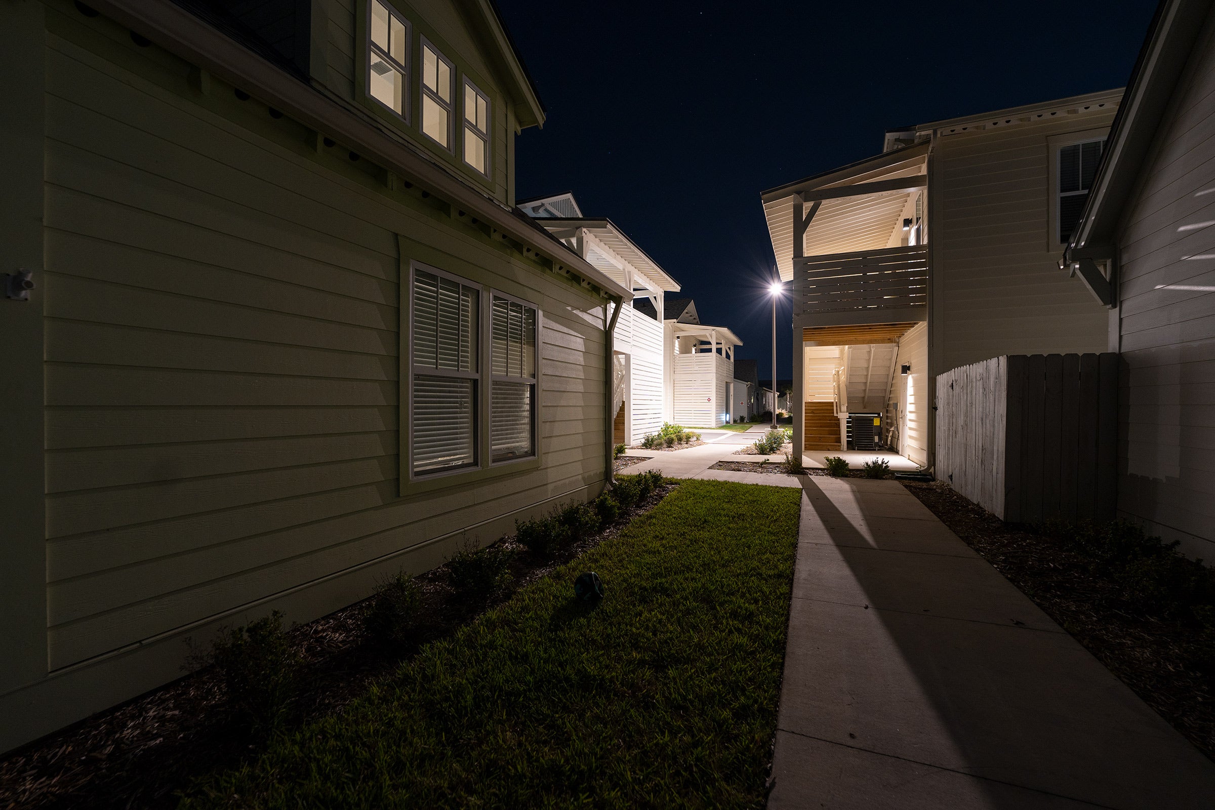 A night shot of an apartment complex