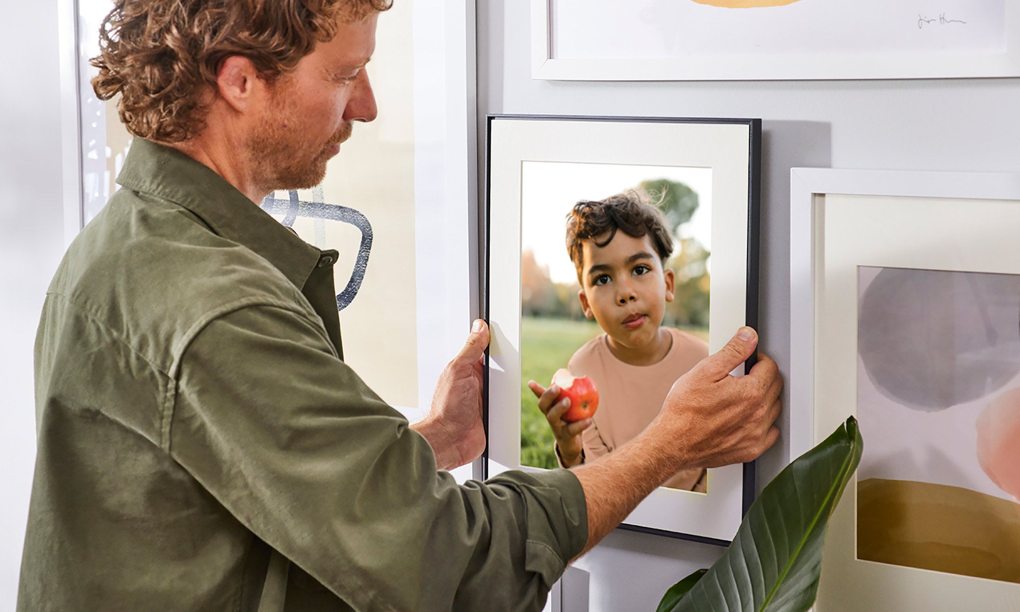 The Aura Walden is a 15-inch, wall-mountable digital photo frame