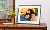 The modern-looking Aura Walden digital picture frame displays a family photo on a tabletop